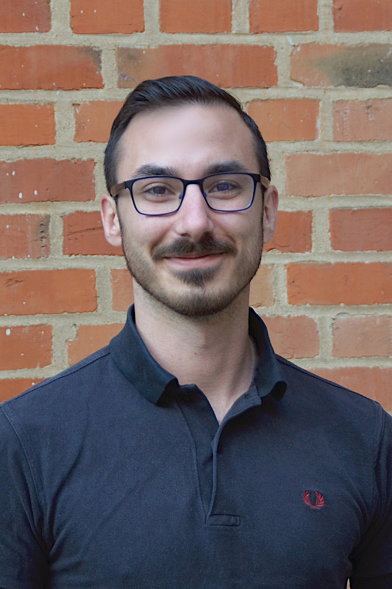This image shows Deniz Patrick  Frost, M.A.